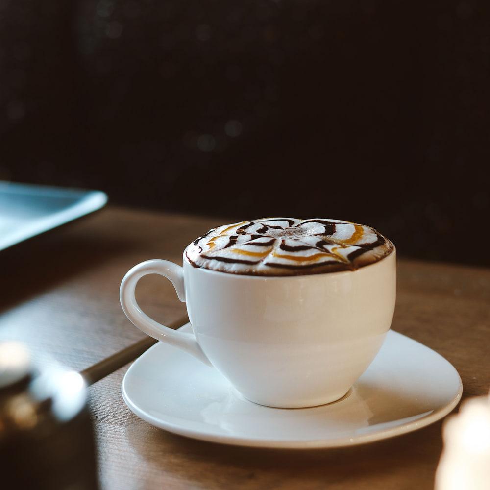 A latte set down on the counter